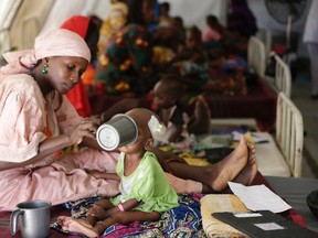 Sunday Alamba/The Associated Press
A mother feeds her malnourished child at a feeding centre run by Doctors Without Borders in Maiduguri Nigeria on Aug. 29, 2016. During its seven-year uprising, Boko Haram extremists have killed more than 20,000 people and displaced more than 2.6 million in Nigeria and neighbouring Cameroon, Niger and Chad.