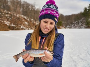 Columnist Ashley Rae with a brook trout caught in Frontenac Provincial Park. (Supplied photo)