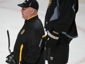 Claude Julien and Zdeno Chara during Boston Bruins practice in March 2014. (Postmedia)