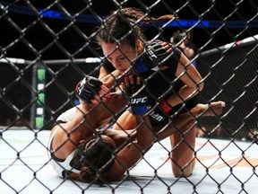 Valerie Letourneau, right, fights Viviane Pereira during UFC 206 at Air Canada Centre on Dec. 10, 2016 in Toronto. (Vaughn Ridley/Getty Images)