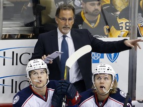 In this Feb. 3, 2017, file photo, Columbus Blue Jackets head coach John Tortorella gestures to an official during the first period of an NHL hockey game against the Pittsburgh Penguins in Pittsburgh. (AP Photo/Gene J. Puskar, File)