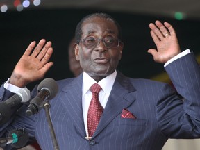 Zimbabwe President Robert Mugabe gestures as he delivers a speech during celebrations to mark his 92nd birthday celebrations in Masvingo on Feb, 27, 2016. Mugabe is turning 93 on Feb. 21. (Tsvangirayi Mukwazhi/AP Photo/Files)
