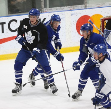 Toronto Maple Leafs Jake Gardiner and Connor Brown around the net at practice in preparation for another Battle of Ontario at the ACC Saturday night in Toronto on Friday February 17, 2017. Jack Boland/Toronto Sun/Postmedia Network