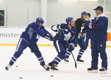 Toronto Maple Leafs Nazem Kadri checks Leo Kormarov out of the face-off during a drill at practice in preparation for another Battle of Ontario at the ACC Saturday night in Toronto on Friday February 17, 2017. Jack Boland/Toronto Sun/Postmedia Network