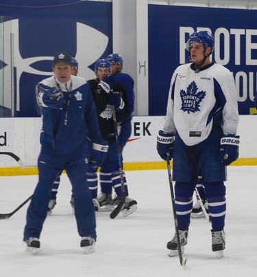 Toronto Maple Leafs coach Mike Babcock and Auston Matthews during a drill at practice in preparation for another Battle of Ontario at the ACC Saturday night in Toronto on Friday February 17, 2017. Jack Boland/Toronto Sun/Postmedia Network