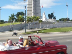 A well preserved 1950 Chevrolet convertible is used as a taxi outside a downtown Havana hotel in this file photo from 2013. The Cuban market is heating up with visitor, and hotel availability is becoming increasingly tight. Travel writer Bob Boughner reports that the island nation’s first five-star hotel will be opening this spring. (File photo/Postmedia Network)