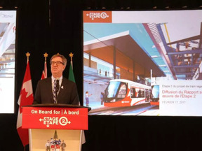 Ottawa Mayor Jim Watson providing a detailed presentation of a related report on Stage 2 LRT at Ottawa City Hall in Ottawa Friday Feb 17, 2017. (Tony Caldwell, Postmedia)