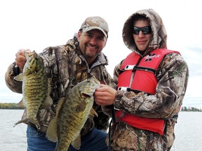 Columnist Frank Clark and his nephew, Zach, hold up some nice bronzebacks. Photo supplied