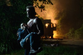Hugh Jackman as Logan/Wolverine and Dafne Keen as Laura in LOGAN. Photo Credit: Ben Rothstein.