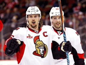 Erik Karlsson of the Ottawa Senators celebrates his goal as teammate Derick Brassard stands by against the New Jersey Devils on February 16, 2017 at Prudential Center in Newark. (Elsa/Getty Images)