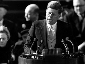 In this Jan. 20, 1961, file President John F. Kennedy delivers his inaugural address after taking the oath of office on Capitol Hill in Washington. (AP Photo, File)