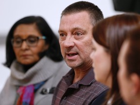 From left, Rita Chahal, Executive Director of Manitoba Interfaith Immigration Council, Greg Janzen, Reeve of Emerson-Franklin, Tara Seel, RCMP and Jeryn Peters, CBSA Chief of Operations Emerson speak to media after a town hall meeting in Emerson, Man. Thursday, February 9, 2016. Refugees have been crossing into Canada at Emerson and authorities had a town hall meeting in Emerson to discuss their options. THE CANADIAN PRESS/John Woods