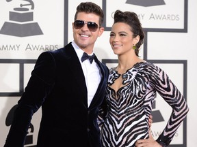 Singer Robin Thicke and actress Paula Patton attends the 56th GRAMMY Awards at Staples Center on January 26, 2014 in Los Angeles, California. (Jason Merritt/Getty Images)