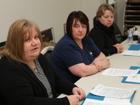 Sharon Richer, left, secretary/treasurer of the Ontario Council of Hospital Unions, makes a point at a press conference on polling results related to hospital laundry workers in Sudbury, Ont. on Friday February 17, 2017. Looking on is Gisele Dawson, middle, president of CUPE Local 2841, and Nicole Mallette, vice-president of Local 2841. John Lappa/Sudbury Star/Postmedia Network
