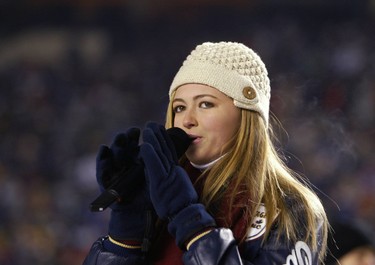 Paulina Gretzky sings the Canadian national anthem before the start of the 2003 Heritage Classic, the NHL's first-ever outdoor game.  (Postmedia Network File Photo)