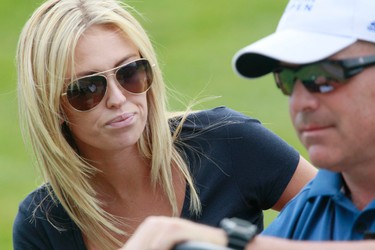 Paulina Gretzky gets driven out of the valley after watching her boyfriend Dustin Johnson play at the Canadian Open Golf tournament,  at Glen Abbey in Oakville, Ont., July 28, 2013. (Stan Behal/Postmedia Network)