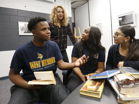 Literacy teacher Mary-Catherine Raterman with students Matthew Newsome, 16, Bianna Fuller, 16 and Karalina Rivera, 16, at West Humber C.I. for Fraser Report story on Tuesday February 7, 2017. Michael Peake/Toronto Sun