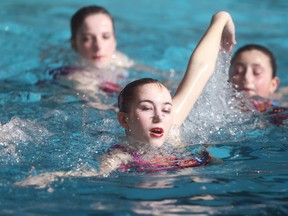A synchronized swimming display was part of the Grand Reopening of the Kinsmen Sherbrook Pool, in Winnipeg. Saturday, February 18, 2017. Chris Procaylo/Winnipeg Sun/Postmedia Network