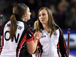 Ontario skip Rachel Homan shakes hands with teammate Emma Miskew after a win over Canada during the Scotties Tournament of Hearts in St. Catharines, Ont., on Saturday, Feb. 18, 2017. (THE CANADIAN PRESS/Sean Kilpatrick)