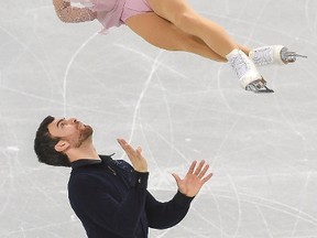 Meagan Duhamel and Eric Radford of Canada perform during the Pair Free Skating event of the ISU Four Continents Figure Skating Championships at Gangneung Ice Arena in Gangneung on February 18, 2017.
The ISU event is a test event for the upcoming PyeongChang 2018 Winter Olympic Games. / AFP PHOTO / KIM DOO-HOKIM DOO-HO/AFP/Getty Images