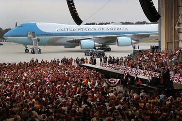 People listen as U.S. President Donald Trump speaks during a campaign rally at the AeroMod International hangar at Orlando Melbourne International Airport on Feb. 18, 2017 in Melbourne, Fla. (Joe Raedle/Getty Images)