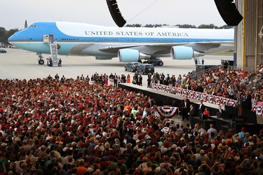 MELBOURNE, FL - FEBRUARY 18:  People listen as President Donald Trump speaks during a campaign rally at the AeroMod International hangar at Orlando Melbourne International Airport on February 18, 2017 in Melbourne, Florida. President Trump is holding his rally as he continues to try to push his agenda through in Washington, DC.  (Photo by Joe Raedle/Getty Images)