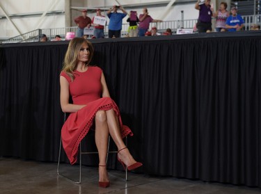 Melania Trump sits and listens to President Donald Trump speak at his "Make America Great Again Rally" at Orlando-Melbourne International Airport in Melbourne, Fla., Saturday, Feb. 18, 2017.  (AP Photo/Susan Walsh)