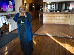 Saciido Shaie, founder and President of the Umma Project tries to call her close friend Mohamed Badal at a Somali restaurant in Minneapolis, Minn., on Thursday, Feb. 16, 2017. Saciido Shaie says something seemed to be weighing on her friend Mohamed Badal in the days before he vanished. Badal, a Somali man who spent months trekking four continents before landing in the United States, had been preparing to appeal a rejected asylum application when Donald Trump became president. THE CANADIAN PRESS/Jonathan Hayward