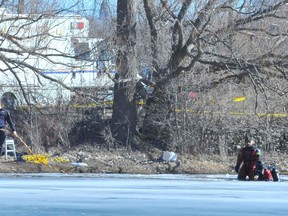 The OPP dive unit out of Gravenhurst recovered the body of a man Sunday who went through the ice at the Waterford North Conservation Area on Saturday. MONTE SONNENBERG / SIMCOE REFORMER