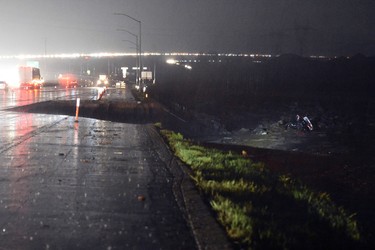 A section of southbound Interstate 15 just south of Hwy 138 is washed away on Friday, Feb., 17, 2017, in the Cajon Pass, Calif. (David Pardo/The Daily Press via AP)  /The Daily Press via AP)