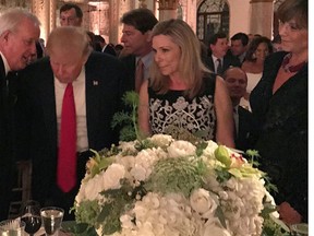 Former prime minister Brian Mulroney talks with U.S. President Donald Trump in Palm Beach, Fla., Saturday, Feb. 18, 2017. THE CANADIAN PRESS/Palm Beach Daily News-Shannon Donnelly