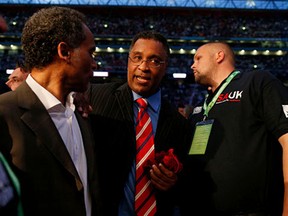 Michael Watson takes his seat before the Carl Froch v George Groves World Super-middleweight fight at Wembley Stadium on May 31st 2014 in London (Tom Jenkins/Getty Images)