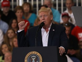 President Donald Trump speaks during a campaign rally at the AeroMod International hangar at Orlando Melbourne International Airport on February 18, 2017 in Melbourne, Florida. President Trump is holding his rally as he continues to try to push his agenda through in Washington, DC. (Photo by Joe Raedle/Getty Images)