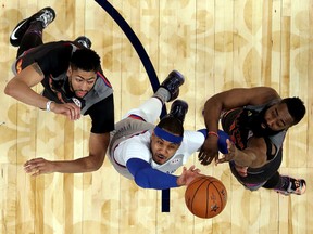 Carmelo Anthony #7 of the New York Knicks takes a shot against Anthony Davis #23 of the New Orleans Pelicans and James Harden #13 of the Houston Rockets during 2017 NBA All-Star Game at Smoothie King Center on February 19, 2017 in New Orleans, Louisiana. (Ronald Martinez/Getty Images)
