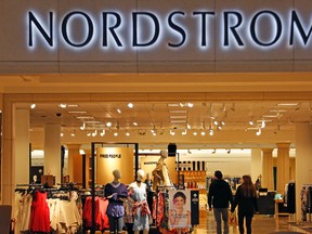 In this Wednesday, Feb. 8, 2017 photo, shoppers walk into a Nordstrom store in Pittsburgh. The Seattle-based retailer stoked U.S. President Donald Trump's rage by dropping his daughter Ivanka's clothing and accessory line. (AP/FILES)