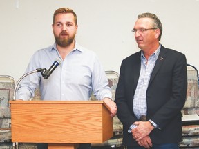 Wildrose MLAs MLAs Derek Fildebrandt, left, and David Schneider stand at the podium ready to answer questions at the “Conservative Unity within Alberta” open house held at the Champion Community Hall Saturday afternoon. Jasmine O’Halloran Vulcan Advocate