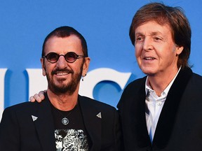 Paul McCartney (R) and  Ringo Starr of legendary rock-band The Beatles are seen in a Sept. 15, 2016 file photo. (BEN STANSALL/AFP/Getty Images)