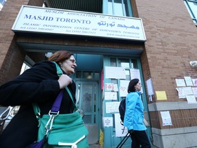 Signs of Muslim support were posted on the wall of the Masjid Toronto on Feb. 20. (STAN BEHAL, Toronto Sun)