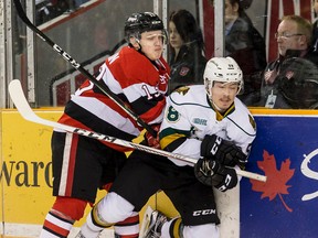 Ottawa 67's Artur Tyanulin checks London Knights Mitchell Vande Sompel during OHL action at TD Arena on Monday February 20, 2017. (Errol McGihon/Postmedia News)