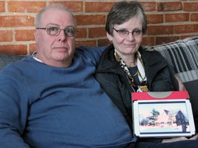 Phil and Jo Mather, at their son's home in Kingston on Saturday, lost their Sydenham home to a fire on Jan. 14. (Steph Crosier/The Whig-Standard)