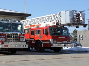 Kingston Fire and Rescue's 2013 pumper truck and soon-to-be-replaced 1990 platform truck at Station 6 on Palace Road on Saturday. (Steph Crosier/The Whig-Standard)
