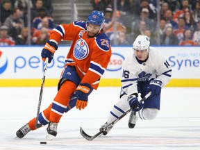 Darnell Nurse of the Edmonton Oilers is pursued by Mitch Marner of the Toronto Maple Leafs at Rogers Place on Nov. 29, 2016. (Getty Images)