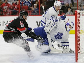 Toronto Maple Leafs goalie Curtis McElhinney stops Joakim Nordstrom of the Carolina Hurricanes on Feb. 19, 2017 in Raleigh, N.C.. Toronto won 4-0. (GERRY BROOME/AP)