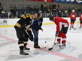 Miss Chimo Emilie Ayotte drops the puck for the annual Firefighters versus OPP.