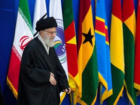 Iran's supreme leader Ayatollah Ali Khamenei arrives to a conference titled "International Conference in Support of Palestinian Intifada," in Tehran, Iran, Tuesday, Feb. 21, 2017. Iran's supreme leader has used the podium of the pro-Palestinian gathering in Tehran to call Israel a "fake" nation and a "dirty chapter" of history. (AP Photo/Ebrahim Noroozi)