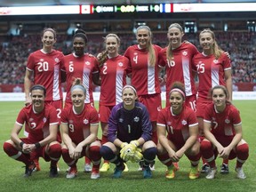 Canada's women's soccer team poses for a photo prior to first half international friendly soccer action against Mexico at B.C. Place, in Vancouver on Saturday, Feb. 4, 2017. The team will host Costa Rica in a pair of June friendlies in Winnipeg and Toronto. THE CANADIAN PRESS/Jonathan Hayward
