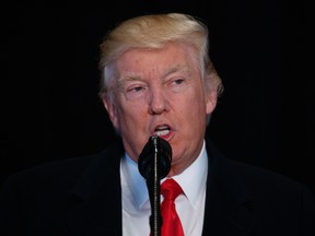 U.S. President Donald Trump speaks after touring the National Museum of African American History and Culture, Tuesday, Feb. 21, 2017, in Washington. (AP Photo/Evan Vucci)