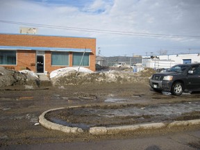 St. Matthews Avenue near Berry Street appears to be as much hole as it is road.