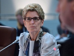 Liberal Kathleen Wynne and the provincial government can no longer count on big annual increases in federal transfers and will now have to address its own spending to get its fiscal house in order. (THE CANADIAN PRESS/PHOTO)
