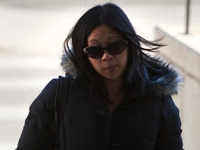 Lily Choy walks into the courthouse on October, 21 2011 for sentencing after being found guilty of manslaughter for killing a 3 year old boy in Edmonton.  Greg Southam/Postmedia